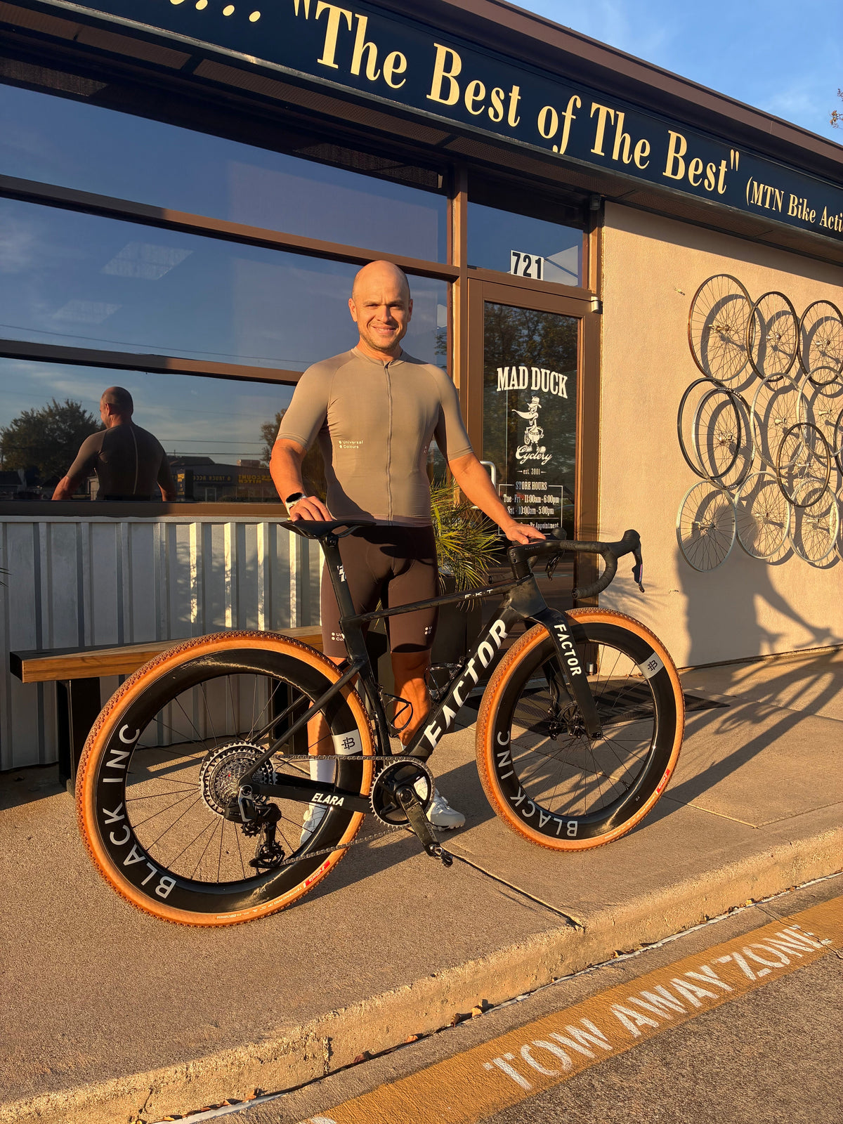Carlos with his new Factor ELARA gravel bike outside Mad Duck Cyclery