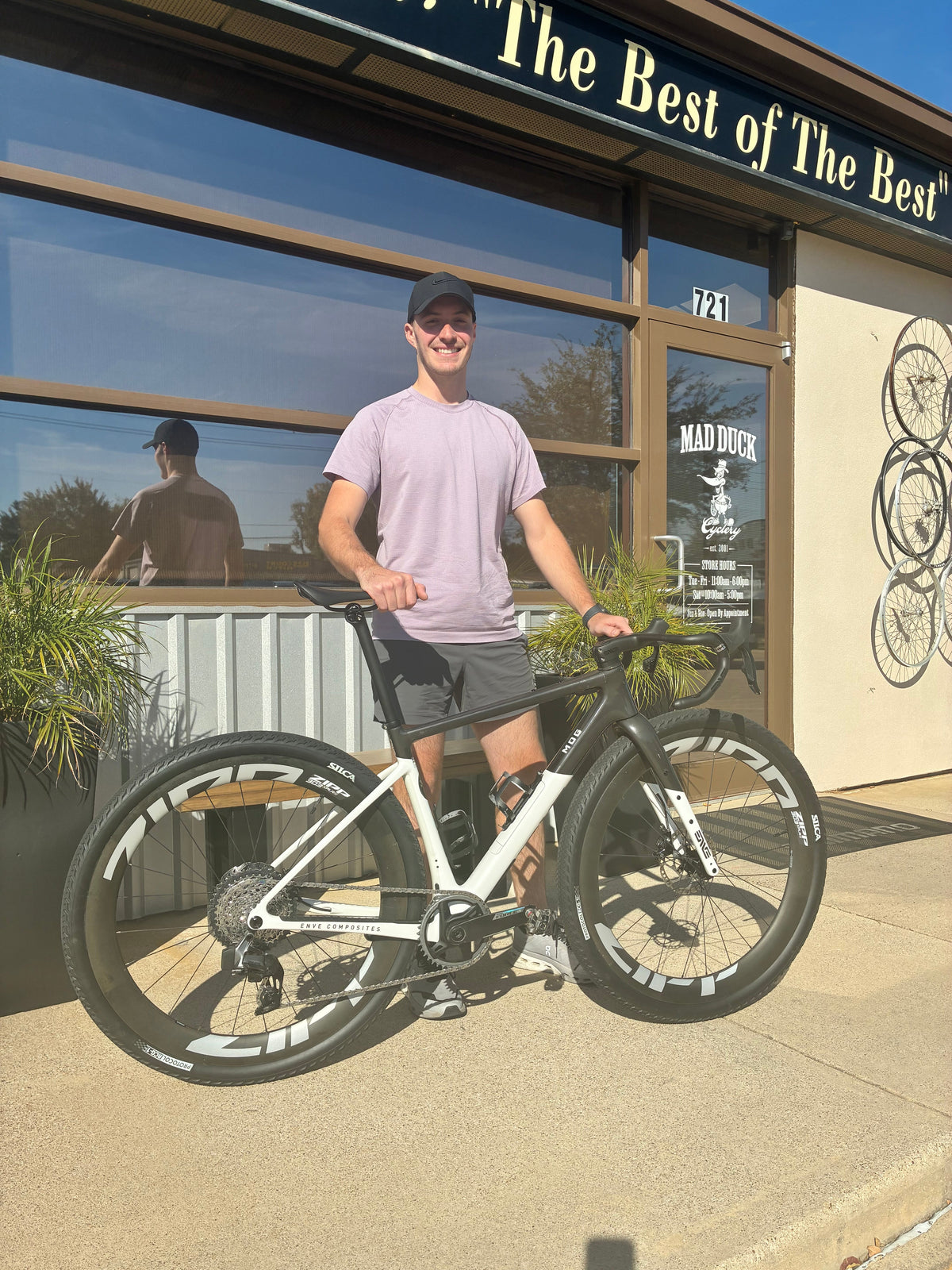 Ruben with his ENVE MOG, custom Zipp XPLR wheels and SILCA tires outside Mad Duck Cyclery