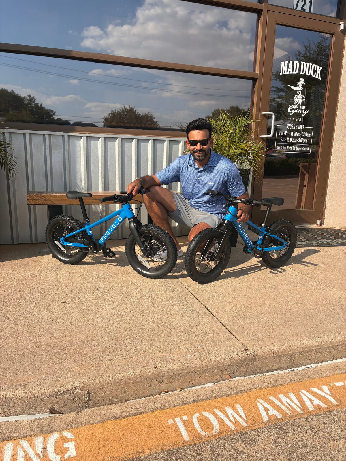 Mad Duck bike of the day 08 - two blue Prevelo kids bikes with rider