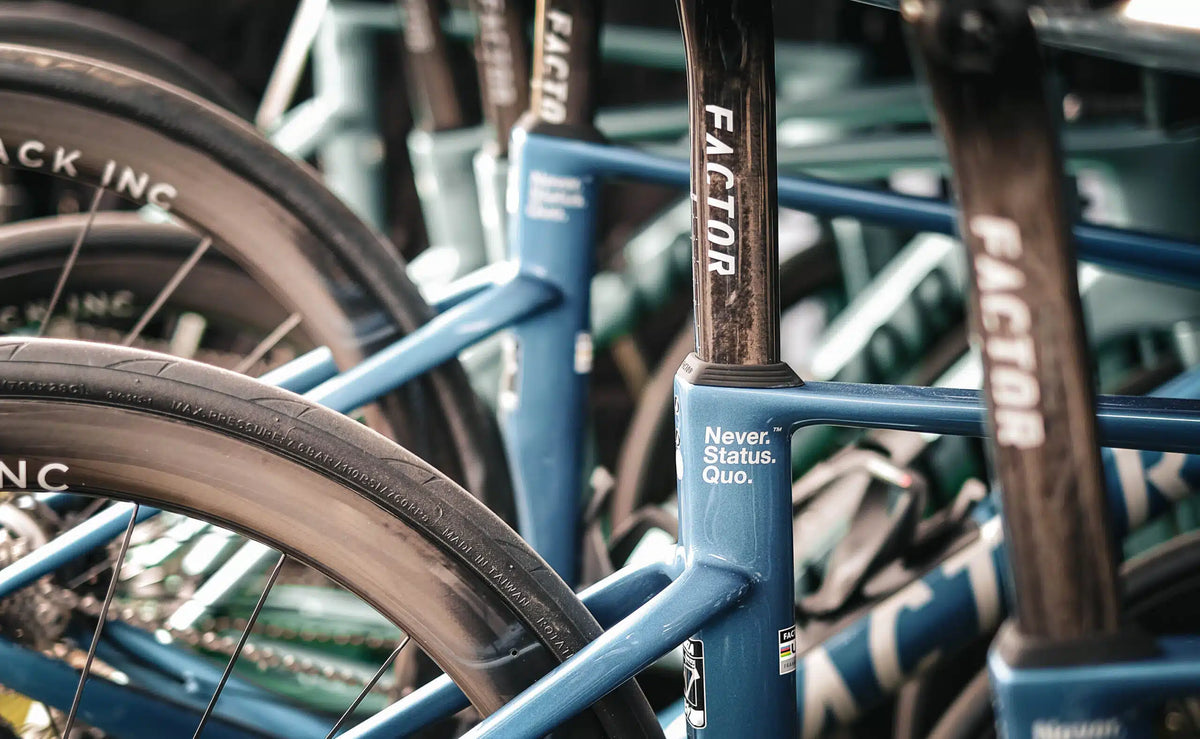 A lineup of Factor road bikes photographed for a Vires Velo demo event